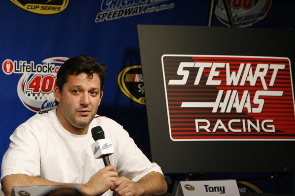 FILE - NASCAR driver Tony Stewart announces he will become a driver and co-owner of Haas CNC Raging Thursday, July 10, 2008, at ChicagoLand Speedway in Joliet, Ill. Stewart-Haas Racing will close its NASCAR team at the end of the 2024 season, co-team owners Tony Stewart and Gene Haas said in a joint statement Tuesday, May 28, 2024. (AP Photo/Nam Y. Huh, FIle)