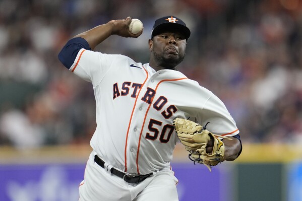 Houston Astros relief pitcher Hector Neris throws during the fourth inning of Game 7 of the baseball AL Championship Series against the Texas Rangers Monday, Oct. 23, 2023, in Houston. (AP Photo/Godofredo A. Vásquez)