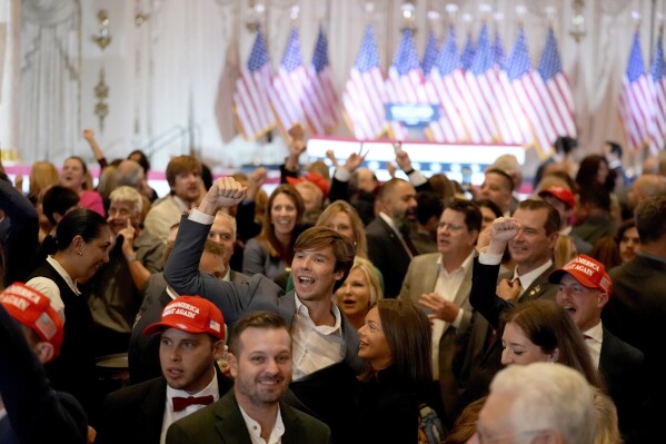 Supporters attend a Super Tuesday election night party before Republican presidential candidate former President Donald Trump speaks, Tuesday, March 5, 2024, at Mar-a-Lago in Palm Beach, Fla. (AP Photo/Rebecca Blackwell)