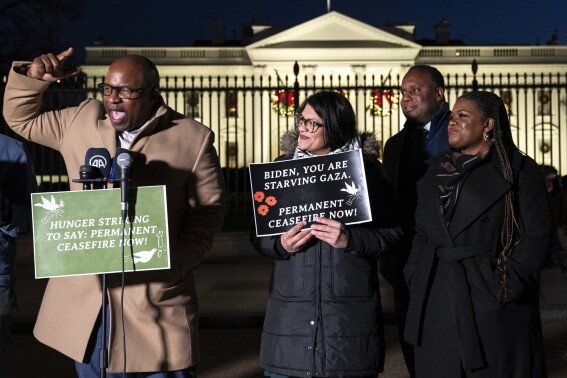 FILE - Rep. Jamaal Bowman, D-N.Y., from left, speaks alongside, Rep. Rashida Tlaib, D-Mich., Rep. Jonathan Jackson, D-Ill., and Rep. Cori Bush, D-Mo., during a vigil with state legislators and faith leaders currently on hunger strike outside the White House to demand that President Joe Biden call for a permanent ceasefire in Gaza on Nov. 29, 2023. (AP Photo/Nathan Howard, File)