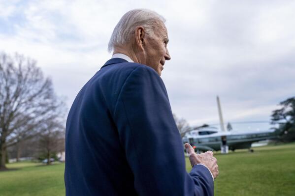 President Joe Biden speaks to members of the media before boarding Marine One on the South Lawn of the White House in Washington, Friday, Feb. 24, 2023, for travel to Wilmington, Del. (AP Photo/Andrew Harnik)
