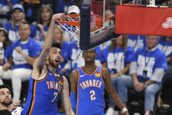 Oklahoma City Thunder forward Chet Holmgren dunks during the second half in Game 1 of an NBA first-round playoff series against the Memphis Grizzlies, Tuesday, April 22, 2025, in Oklahoma City. (AP Photo/Kyle Phillips)