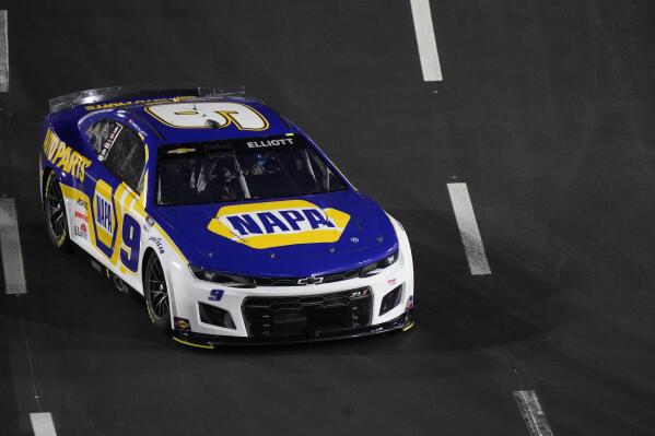 Chase Elliott heads into a turn during a qualifying session at Los Angeles Memorial Coliseum Saturday, Feb. 5, 2022, in Los Angeles. NASCAR will stage an exhibition auto race Sunday at the Coliseum. (AP Photo/Marcio Jose Sanchez)