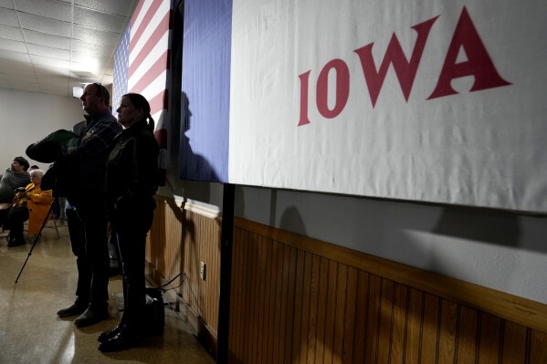 FILE - Audience members listen to Republican presidential candidate Nikki Haley speak during a town hall, Friday, Nov. 17, 2023, in Ankeny, Iowa. Former President Donald Trump was the first choice of 51% of likely Iowa caucus participants in a Des Moines Register-NBC News-Mediacom Iowa Poll published Monday, Dec. 11. Florida Gov. Ron DeSantis, who has vowed that he will win Iowa, had the support of 19%. Former United Nations Ambassador Nikki Haley, who has suggested she can beat DeSantis in the state and go head to head with Trump in later primaries, was at 16%. (AP Photo/Charlie Neibergall, File)