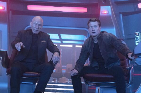 This image released by Paramount+ shows Patrick Stewart as Picard, left, and Ed Speleers as Jack Crusher in the "No Win Scenario" episode of "Star Trek: Picard." (Trae Patton/Paramount+ via AP)