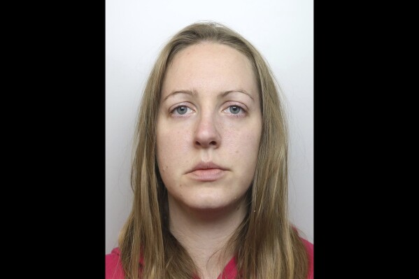 This undated photo issued by Cheshire Constabulary, shows nurse Lucy Letby. Letby, a former neonatal nurse who was sentenced to life in prison for the murder of seven babies in her care and trying to kill six others at a U.K. hospital will face a retrial on a charge of attempting to murder a newborn baby girl, prosecutors said Monday, Sept. 25, 2023. (Cheshire Constabulary via AP)