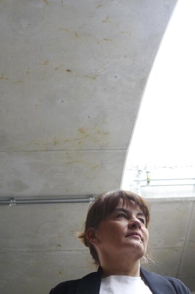 Member of the organization Abortion Dream Team Justyna Wydrzynska poses for a photograph prior to a media conference in Brussels, Thursday, March 23, 2023. Justyna Wydrzynska, a women's rights activist, was recently convicted by a Warsaw court for helping a pregnant victim of domestic violence access abortion pills in Poland, sentencing her to eight months of community service. The case has been closely watched by human rights activists, who believe it would set a precedent in a country with some of Europe's most restrictive abortion legislation. (AP Photo/Lorne Cook)