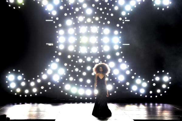 A model walks the runway at the Celine Fall/Winter 2023 Fashion Show on Thursday, Dec. 8, 2022, at The Wiltern in Los Angeles. (Photo by Jordan Strauss/Invision/AP)