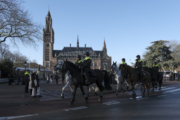 Police are on horsebacks outside the Peace Palace, which houses the International Court of Justice, or 老澳门六合彩 Court, in The Hague, Netherlands, Friday, Jan. 26, 2024. Israel is set to hear whether the United Nations' top court will order it to end its military offensive in Gaza during a case filed by South Africa accusing Israel of genocide. (AP Photo/Patrick Post)