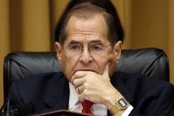 FILE - In this July 24, 2019, file photo, House Judiciary Committee Chairman Jerrold Nadler, D-N.Y., listens as former special counsel Robert Mueller testifies before the House Judiciary Committee on Capitol Hill, in Washington. The messages coming from House Democrats on impeachment in recent weeks are decidedly confusing. House Speaker Nancy Pelosi has said Democrats need to wait for court decisions before they decide whether to approve articles of impeachment. At the same time, Nadler, said Aug. 8 that what his committee is doing now amounts to “formal impeachment proceedings” _ and that Democrats will make a final decision by the end of the year. (AP Photo/Alex Brandon, File)