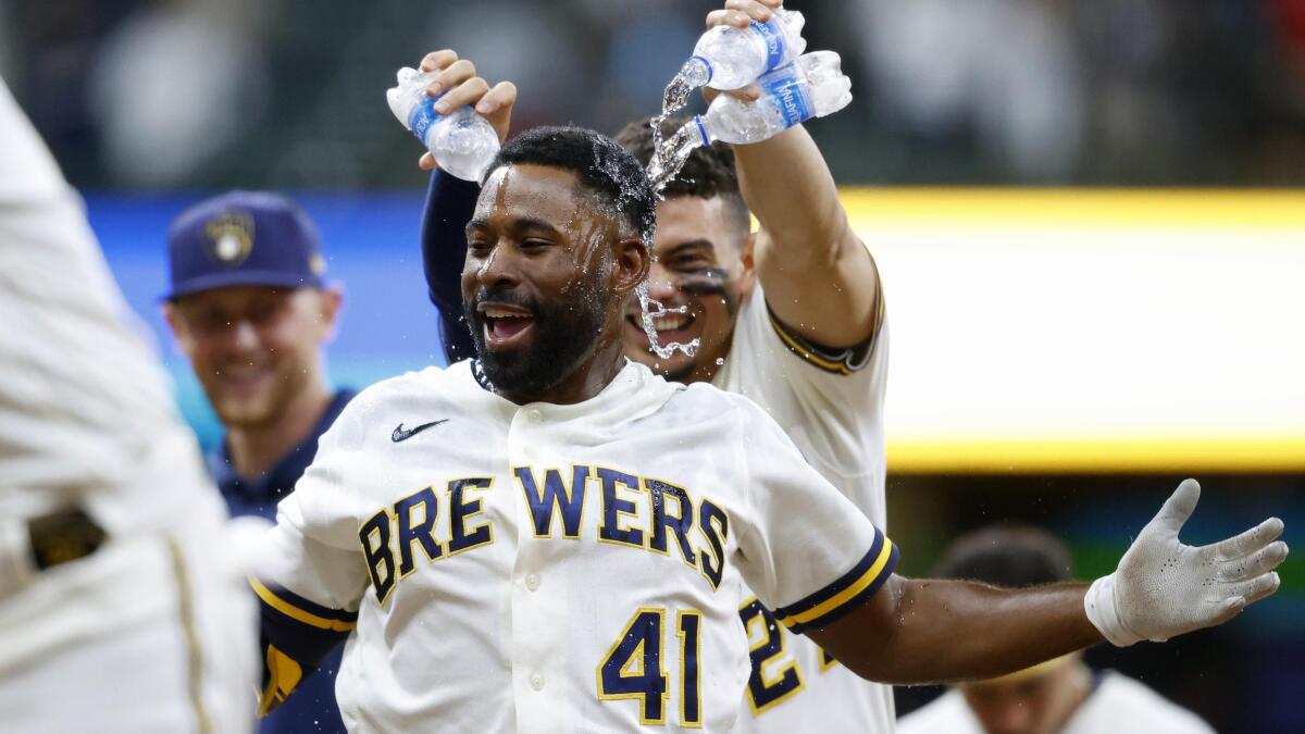 Bradley's hit in 10th gives Brewers 6-5 victory over Padres