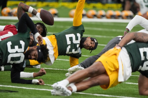 Green Bay Packers' Jaire Alexander stretches during an NFL football practice Tuesday, May 21, 2024, in Green Bay, Wis. (AP Photo/Morry Gash)