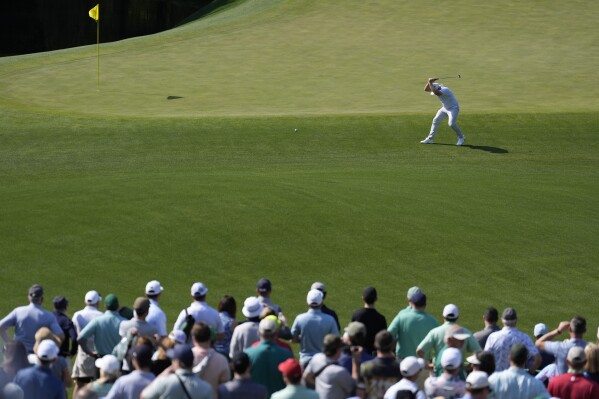 Tyrrell Hatton, of England, reacts on the 11th hole during a practice round in preparation for the Masters golf tournament at Augusta National Golf Club Wednesday, April 10, 2024, in Augusta, GA. (AP Photo/Ashley Landis)