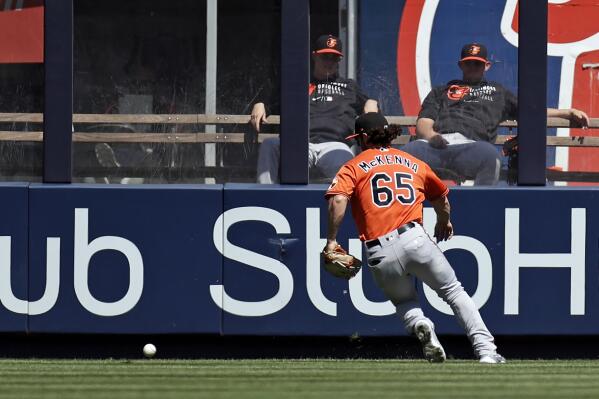 O's rally against Chapman, win after nearly no-hitting Yanks