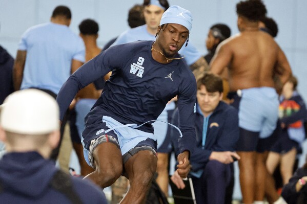 FILE - North Carolina wide receiver Devontez Walker participates in the team's NFL football pro day in Chapel Hill, N.C., March 28, 2024. The Baltimore Ravens drafted Walker in the fourth round of the NFL Draft in April. (AP Photo/Karl B DeBlaker, File)