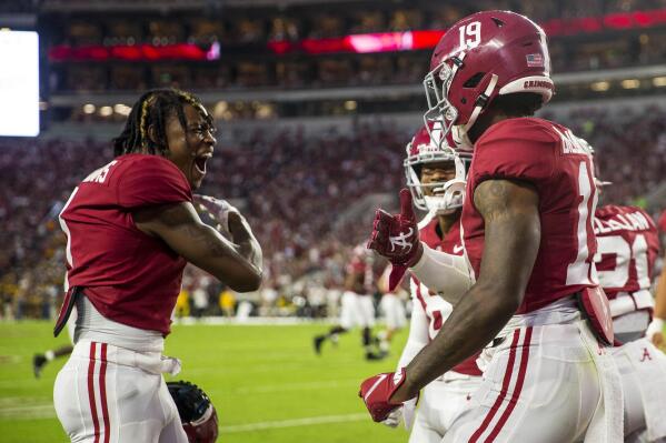 Alabama wide receiver Jameson Williams (1) celebrates with tight end Jahleel Billingsley (19) after Billingsley's touchdown against Southern Miss during the first half of an NCAA college football game, Saturday, Sept. 25, 2021, in Tuscaloosa, Ala. (AP Photo/Vasha Hunt)