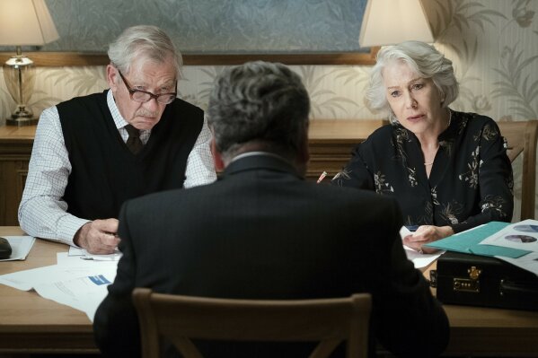 This image released by Warner Bros. Pictures shows Ian McKellen, left, and Helen Mirren in a scene from "The Good Liar." (Chia James/Warner Bros. Pictures via AP)