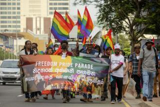 Members of Sri Lanka’s LGBTQ+ community parade demanding an end to discrimination as they mark the Pride month in Colombo, Sri Lanka, Sunday, June 4, 2023. (AP Photo)