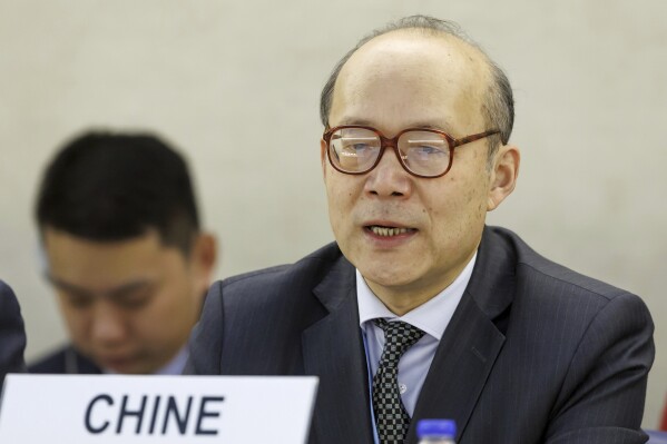 Chen Xu, Ambassador of the Permanent Representative Mission of the China to the UN Geneva, who is leading China's delegation, addresses his statement, during the U.N. Human Rights Council's Universal Periodic Review (UPR) Working Group meeting to review China's human rights record, at the European headquarters of the United Nations in Geneva, Switzerland, Tuesday, Jan. 23, 2024. (Salvatore Di Nolfi/Keystone via AP)