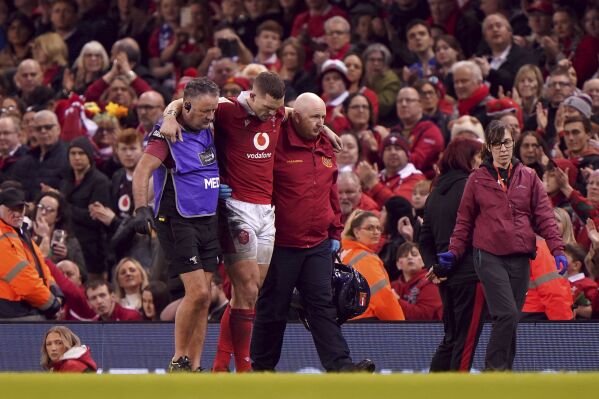 Wales' George North goes off injured during the Six Nations rugby union international match between Wales and Italy, at the Principality Stadium in Cardiff, Wales, Saturday March 16, 2024. (Joe Giddens/PA via AP)