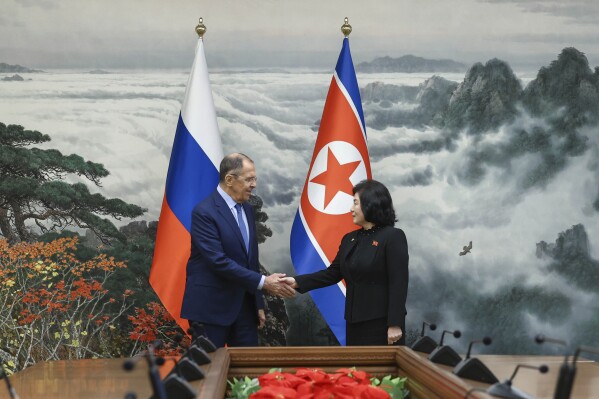 In this photo released by the Russian Foreign Ministry Press Service via their telegram channel, Russian Foreign Minister Sergey Lavrov, left, and North Korean Foreign Minister Choe Son Hui shake hands during their meeting in Pyongyang, North Korea, on Thursday, Oct. 19, 2023. (Russian Foreign Ministry Press Service telegram channel via AP)