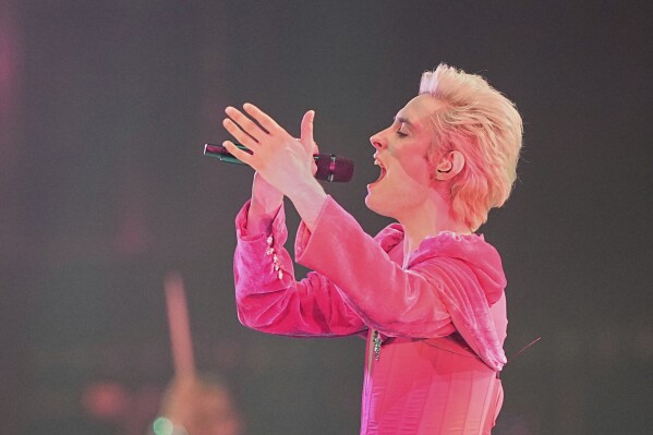 Ziferblat from Ukraine performs the song "Bird of Pray" during the first semi-final of the 69th Eurovision Song Contest, in Basel, Switzerland, Tuesday, May 13, 2025. (AP Photo/Martin Meissner)