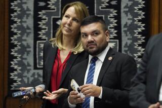 FILE - Rep. Andres Cano, D-Tucson, center, watches a vote on the Arizona budget at the state Capitol on June 24, 2021, in Phoenix. Arizona House Democratic Leader Cano announced Saturday, May 6, 2023, that he intends to resign when the current legislative session ends so he can begin pursuit of a graduate degree this summer at the Harvard Kennedy School. (AP Photo/Ross D. Franklin, File)