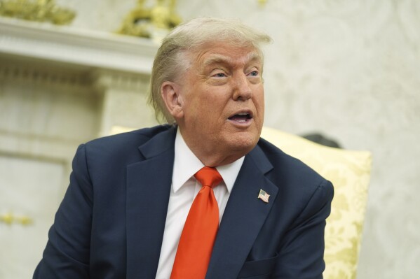 President Donald Trump speaks during a meeting with Germany's Chancellor Friedrich Merz in the Oval Office of the White House, Thursday, June 5, 2025, in Washington. (AP Photo/Evan Vucci)