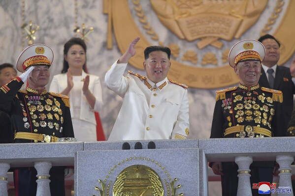 FILE - In this photo provided by the North Korean government, North Korean leader Kim Jong Un, center, watches a military parade to mark the 90th anniversary of North Korea's army at the Kim Il Sung Square in Pyongyang, North Korea on April 25, 2022. Independent journalists were not given access to cover the event depicted in this image distributed by the North Korean government. The content of this image is as provided and cannot be independently verified. Korean language watermark on image as provided by source reads: "KCNA" which is the abbreviation for Korean Central News Agency. (Korean Central News Agency/Korea News Service via AP, File)