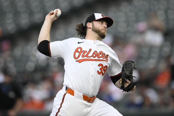 Baltimore Orioles starting pitcher Corbin Burnes throws during the second inning of a baseball game against the Chicago Cubs, Wednesday, July 10, 2024, in Baltimore. (AP Photo/Nick Wass)