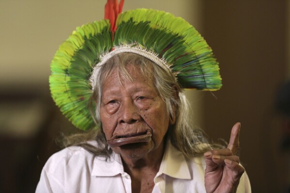 Chief Raoni Metuktire gives an interview in Brasilia, Brazil, Wednesday, June 7, 2023. Raoni, who became a symbol of the fight for the preservation of the Amazon rainforest, called upon Brazil's president on Friday, July 28, 2023 to defend the rights of Indigenous people. (AP Photo/Gustavo Moreno)