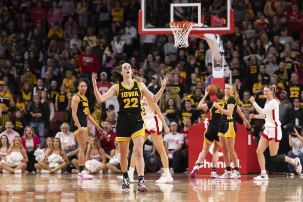Iowa's Caitlin Clark (22) reacts after being called for a foul against Nebraska during the second half of an NCAA college basketball game Sunday, Feb. 11, 2024, in Lincoln, Neb. (AP Photo/Rebecca S. Gratz)