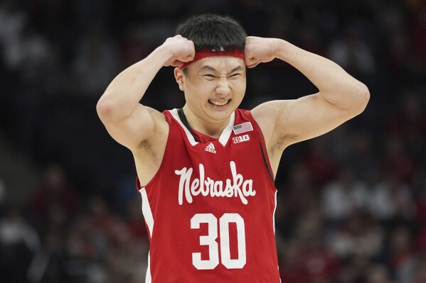 Nebraska guard Keisei Tominaga (30) reacts after missing a shot during the second half of an NCAA college basketball game against Illinois in the semifinal round of the Big Ten Conference tournament, Saturday, March 16, 2024, in Minneapolis. (AP Photo/Abbie Parr)