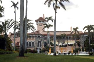 FILE - President Donald Trump's Mar-a-Lago estate is seen from the media van in the presidential motorcade in Palm Beach, Fla., March 24, 2018, en route to Trump International Golf Club in West Palm Beach, Fla. Christina Bobb, a lawyer for former president Donald Trump who signed a letter stating that a “diligent search” for classified records had been conducted and that all such documents had been given back to the government has spoken with the FBI, according to a person familiar with the matter. (AP Photo/Carolyn Kaster, File)