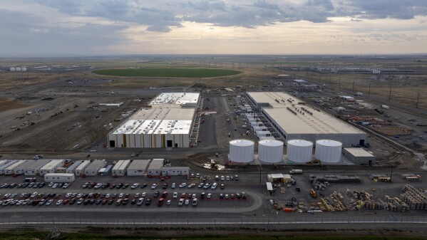 Construction is seen at an Amazon Web Services data center on Thursday, Aug. 22, 2024, in Boardman, Ore. (AP Photo/Jenny Kane)