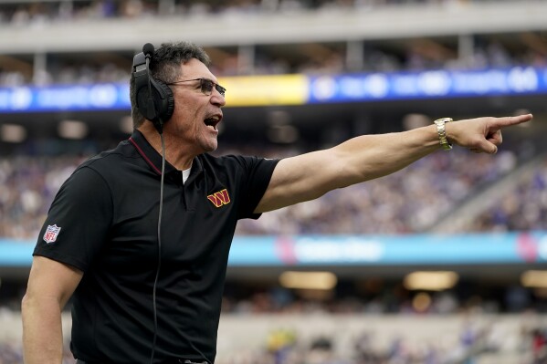 Washington Commanders head coach Ron Rivera gestures on the sideline during the first half of an NFL football game Sunday, Dec. 17, 2023, in Los Angeles. (AP Photo/Ryan Sun)