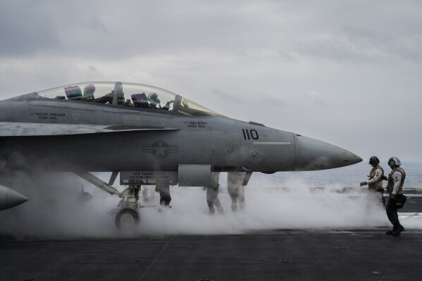 F/A-18F Super Hornet fighter jet takes off from the aircraft carrier U.S.S. Dwight D. Eisenhower, also known as the 'IKE', in the south Red Sea, Tuesday, Feb. 13, 2024. (APPhoto/Bernat Armangue)