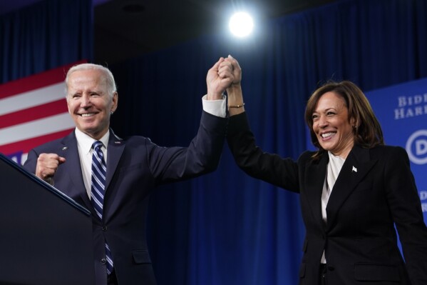 FILE - President Joe Biden and Vice President Kamala Harris stand on stage at the Democratic National Committee winter meeting, Feb. 3, 2023, in Philadelphia. (ĢӰԺ Photo/Patrick Semansky, File)