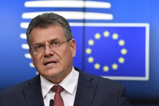 European Commission Vice-President Maros Sefcovic speaks during a media conference, after a General Affairs Council meeting, at the European Council building in Brussels, Tuesday, Feb. 23, 2021. (John Thys, Pool via AP)