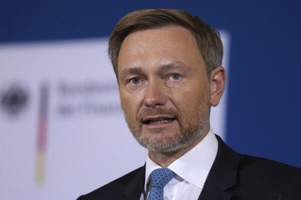 FILE - German Finance Minister Christian Lindner addresses the media during a press conference after a meeting of the stability council in Berlin, Germany, Friday, Dec. 10, 2021. The German government on Monday approved 60 billion euros ($68 billion) in funding to be used for combating climate change and modernizing the country, a move that the new finance minister described as a “booster” for Europe's biggest economy. (AP Photo/Michael Sohn, File)