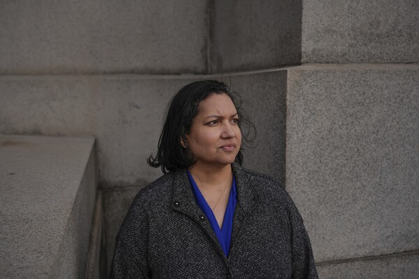 Karen Ortiz, an administrative judge at the Equal Employment Opportunity Commission, poses for photos, Wednesday, Feb. 26, 2025, in New York. (AP Photo/Julia Demaree Nikhinson, file)