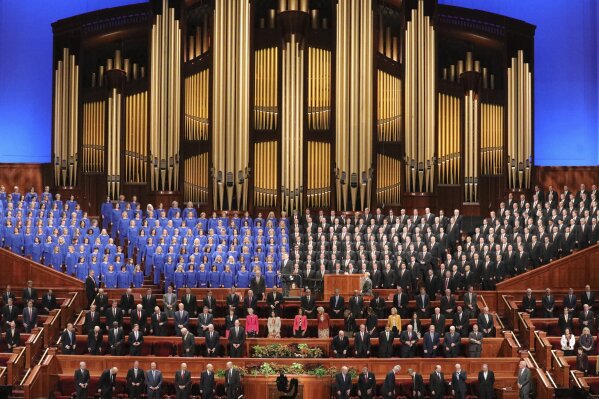 FILE - In this Oct. 5, 2019 file photo, the Tabernacle Choir at Temple Square perform during The Church of Jesus Christ of Latter-day Saints' twice-annual church conference in Salt Lake City. For the third consecutive time, The Church of Jesus Christ of Latter-day Saints will hold its signature conference this weekend without attendees in person as the faith continues to take precautions amid the pandemic.  Members of the Utah-based faith will instead watch on TVs, computers and tablets from their homes around the world Saturday, April 3, 2021 to hear spiritual guidance from the religion's top leaders, who will be delivering the speeches in Salt Lake City.  (AP Photo/Rick Bowmer, File)