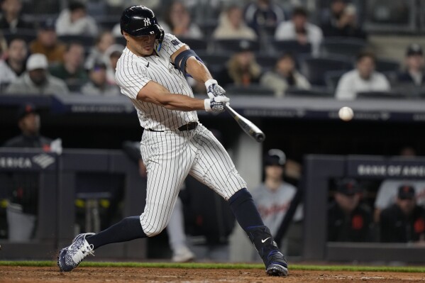 New York Yankees' Giancarlo Stanton hits an RBI double during the ninth inning of a baseball game against the Detroit Tigers, Friday, May 3, 2024, in New York. (AP Photo/Frank Franklin II)
