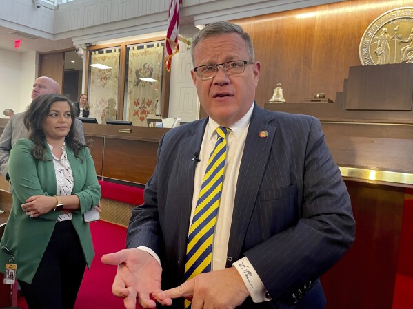 Republican North Carolina House Speaker Tim Moore speaks to reporters about a public records provision in the state budget, on the House floor in Raleigh, N.C., Thursday, Sept. 21, 2023. (AP Photo/Hannah Schoenbaum)