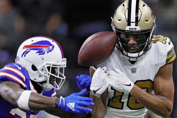 Buffalo Bills cornerback Tre'Davious White (27) defends a pass against New Orleans Saints wide receiver Tre'Quan Smith (10) in the first half of an NFL football game in New Orleans, Thursday, Nov. 25, 2021. (AP Photo/Butch Dill)
