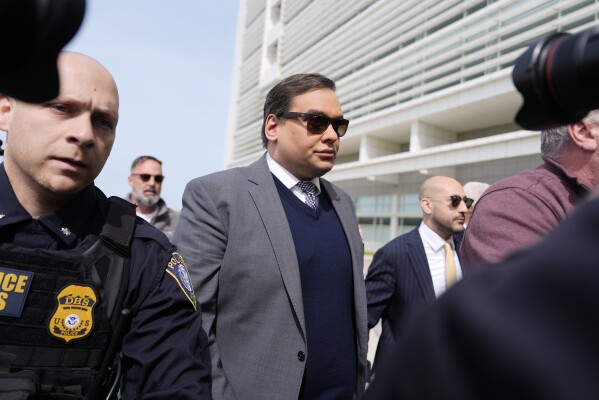 Former U.S. Rep. George Santos arrives at federal court for sentencing, Friday, April 25, 2025, in Central Islip, N.Y. (AP Photo/Julia Demaree Nikhinson)