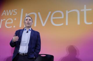 FILE - In this Dec. 5, 2019, file photo, AWS CEO Andy Jassy, discusses a new initiative with the NFL during AWS re:Invent 2019 in Las Vegas. In his first letter to Amazon shareholders, Jassy offered a defense of wages and benefits the company gives its warehouse workers while also vowing to improve injury rates inside the facilities. Jassy, who took over from Amazon founder Jeff Bezos as CEO last July, wrote the company has researched and created a list of the top 100 “employee experience pain points” and is working to solve them. A report released this week by a coalition of four labor unions found Amazon employed 33% of all U.S. warehouse workers in 2021, but was responsible for 49% of all injuries in the industry. (Isaac Brekken/AP Images for NFL, File)