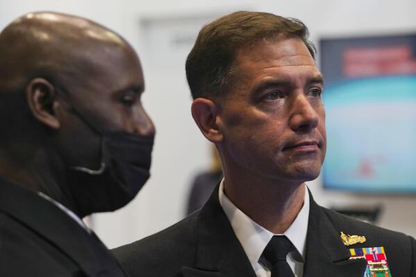 U.S. Navy Vice Adm. Brad Cooper, who oversees the Mideast-based 5th Fleet, attends the Unmanned System Exhibition and Conference in Abu Dhabi, United Arab Emirates, Monday, Feb. 21, 2022. The U.S. Navy's Mideast-based 5th Fleet announced on Monday the launch of a new joint force of unmanned drones with allied nations to patrol vast swaths of the region's volatile waters as tensions simmer with Iran. (AP Photo/Jon Gambrell)