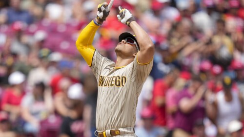 San Diego Padres' Juan Soto reacts as he rounds the bases after hitting a three-run home run during the sixth inning of a baseball game against the Cincinnati Reds Saturday, July 1, 2023, in Cincinnati. (AP Photo/Jeff Dean)