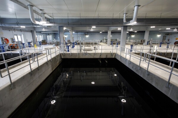 Water is processed through carbon filters inside large reservoirs designed to remove forever chemicals, known as PFAS, at Sweeney Water Treatment Plant in Wilmington, N.C., Monday, April 28, 2025. (AP Photo/Ben McKeown)